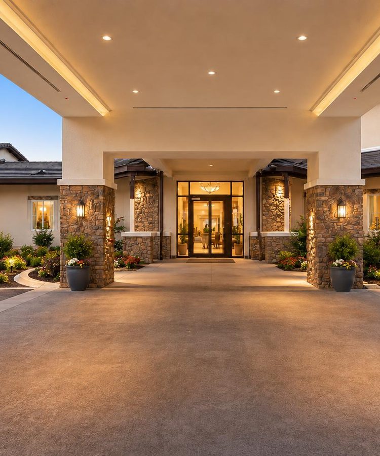 Conceptual architectural rendering of a welcoming covered entrance with stone columns and warm lighting at dusk